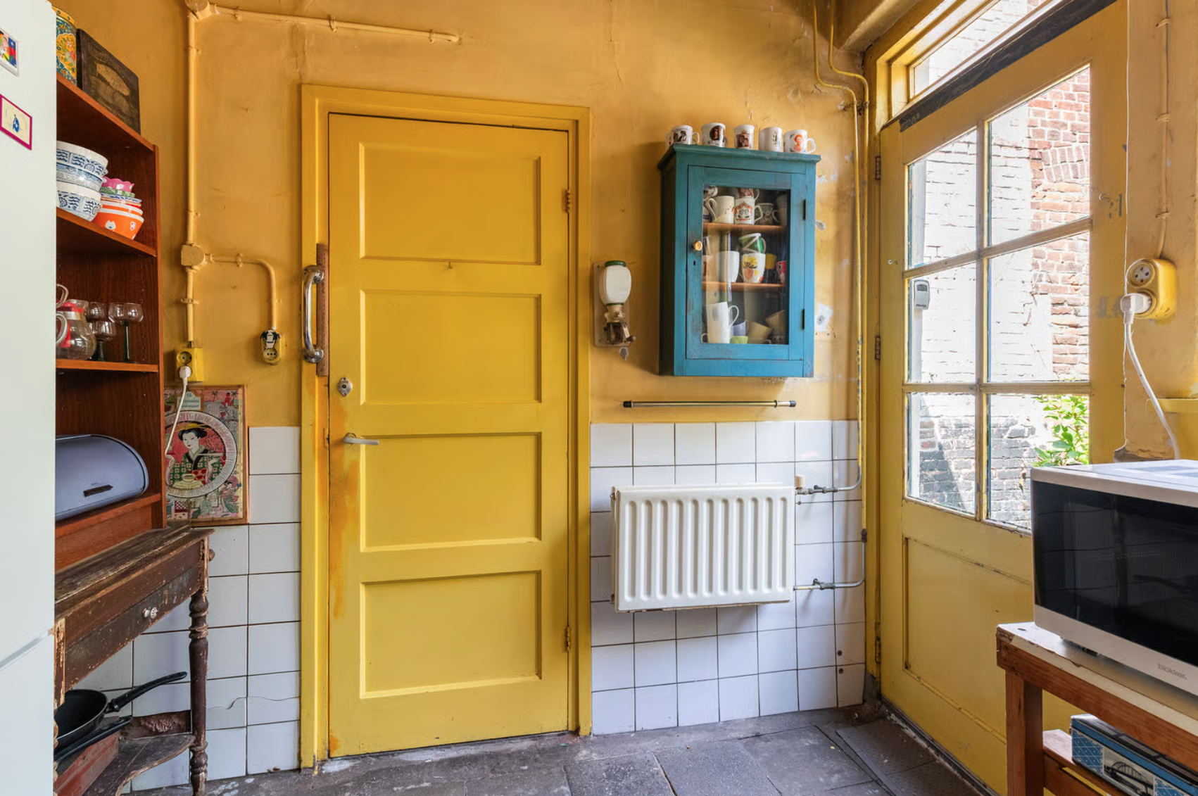 Van een gedateerde, oorspronkelijk dubbele woning naar een royale woonkeuken met ruimte voor een extra zitplek. – foto 6
